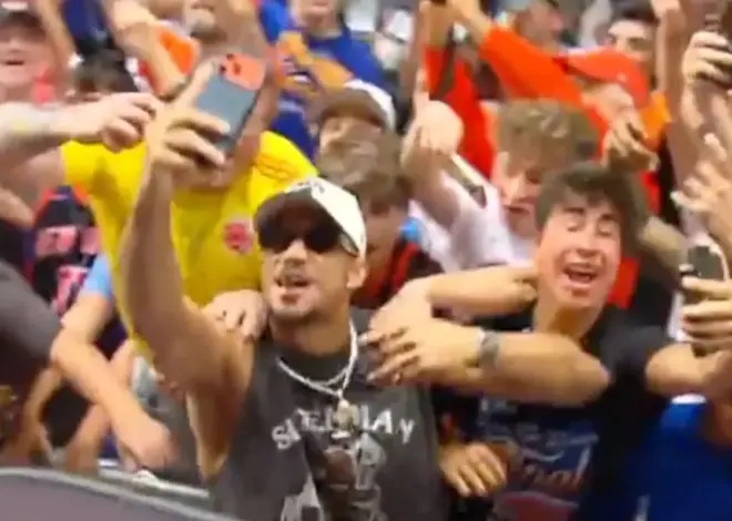 Josh Hart celebrates among fans during wild Knicks parade moment
