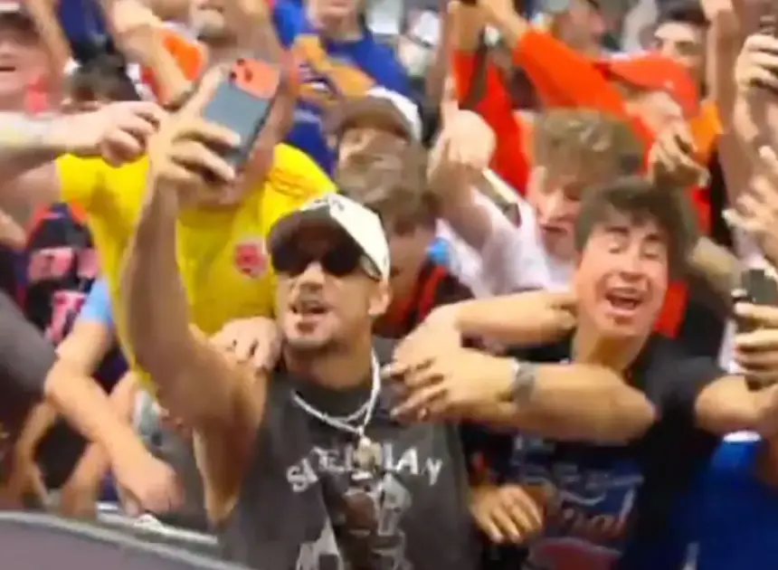 Josh Hart celebrates among fans during wild Knicks parade moment