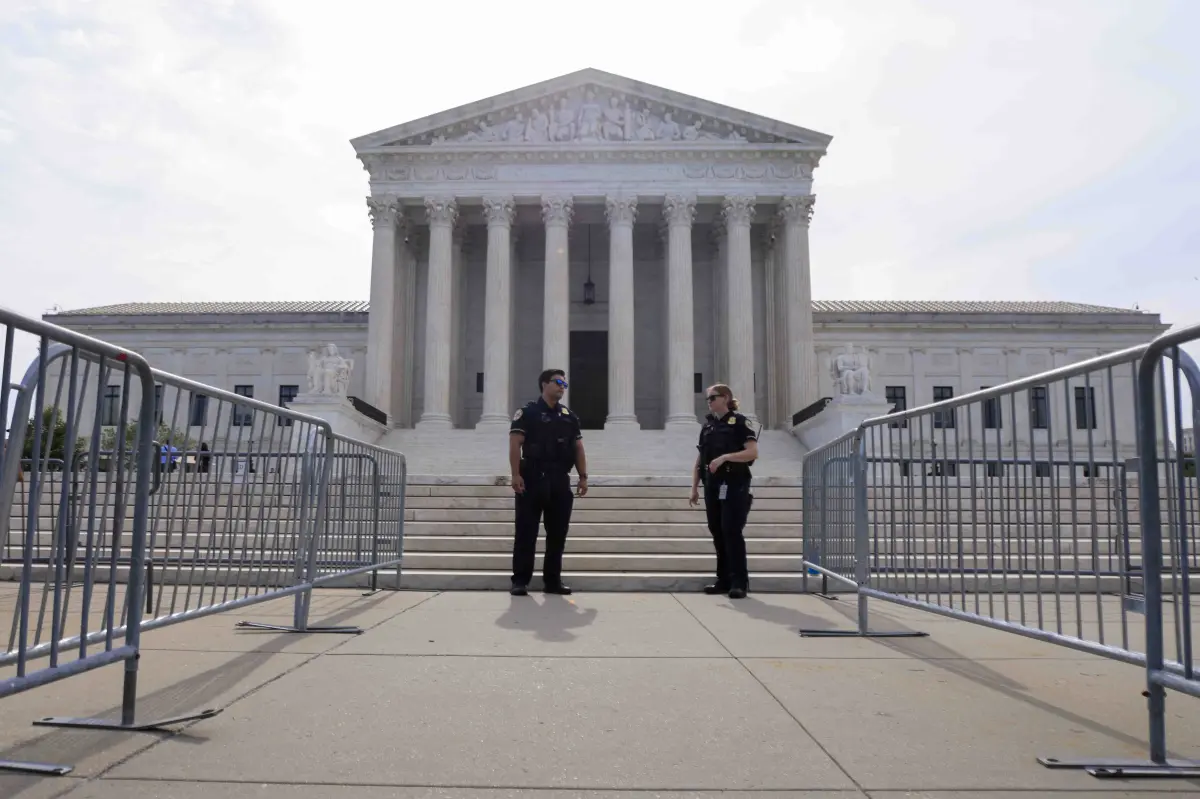 Supreme Court strikes down Hawaii law requiring permission to carry guns in stores and hotels