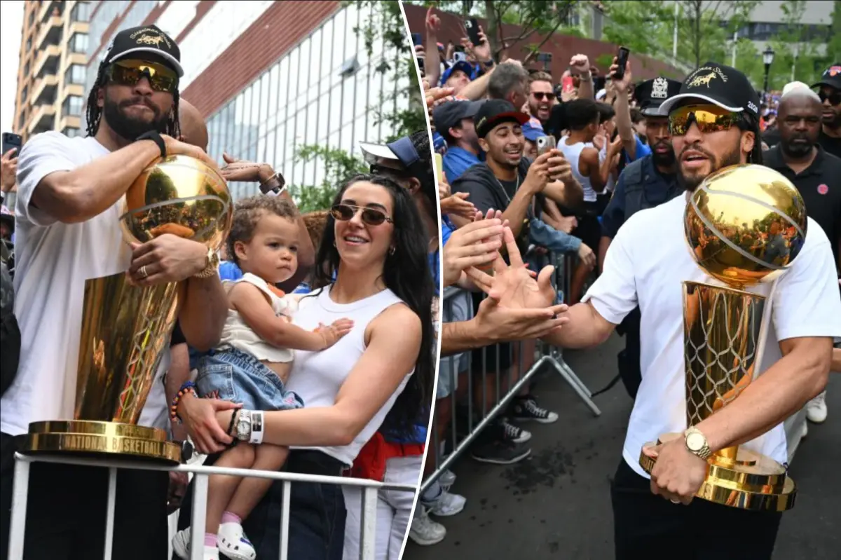 Jalen Brunson lifts Larry O’Brien trophy alongside wife, daughter at Knicks parade