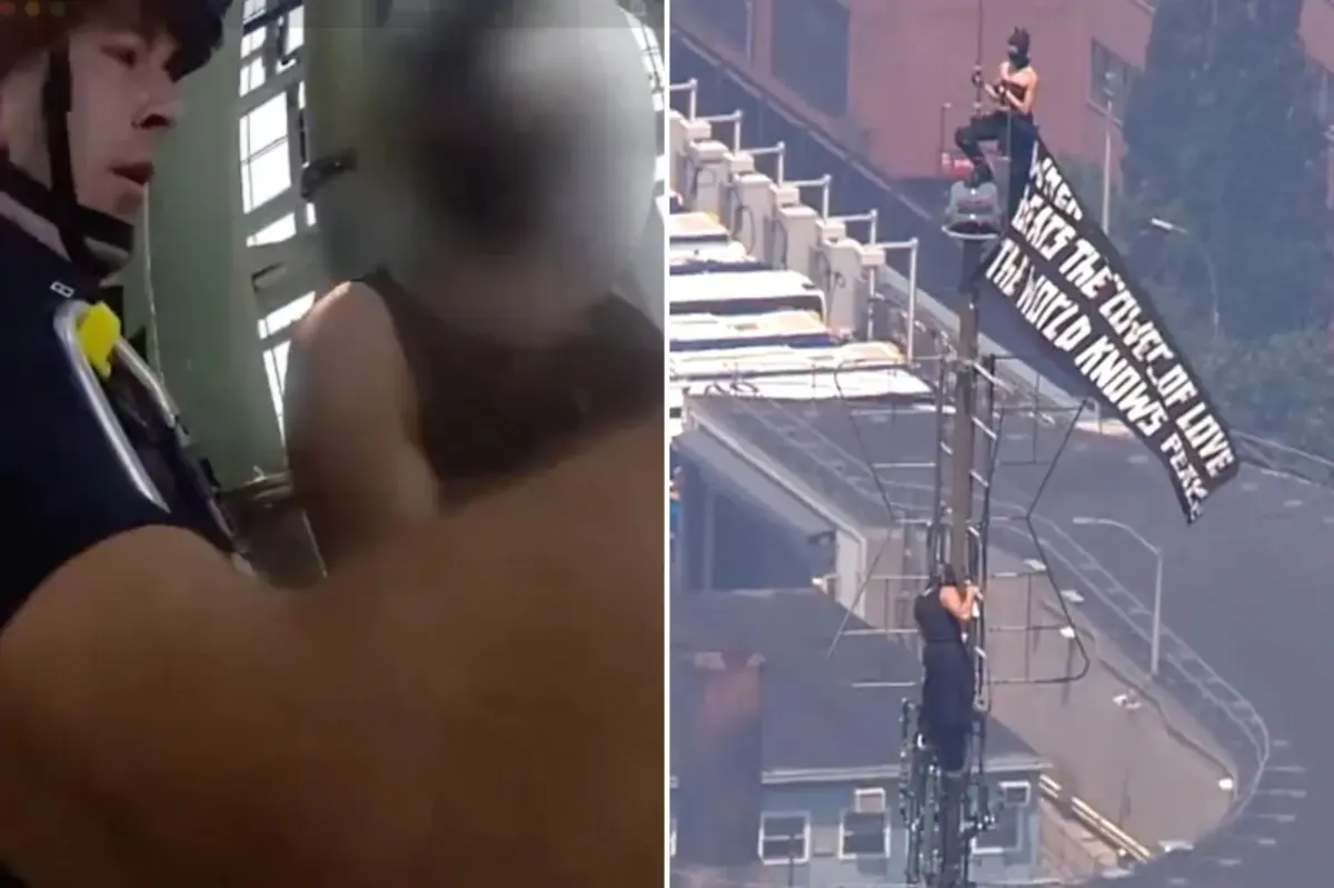 Shocking NYPD bodycam footage shows moment Empire State Building daredevil lovebirds get busted after climbing landmark