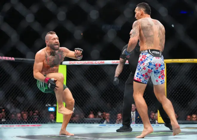 Conor McGregor injures leg seconds into fight in loss to Max Holloway — and is heavily booed by UFC 329 fans