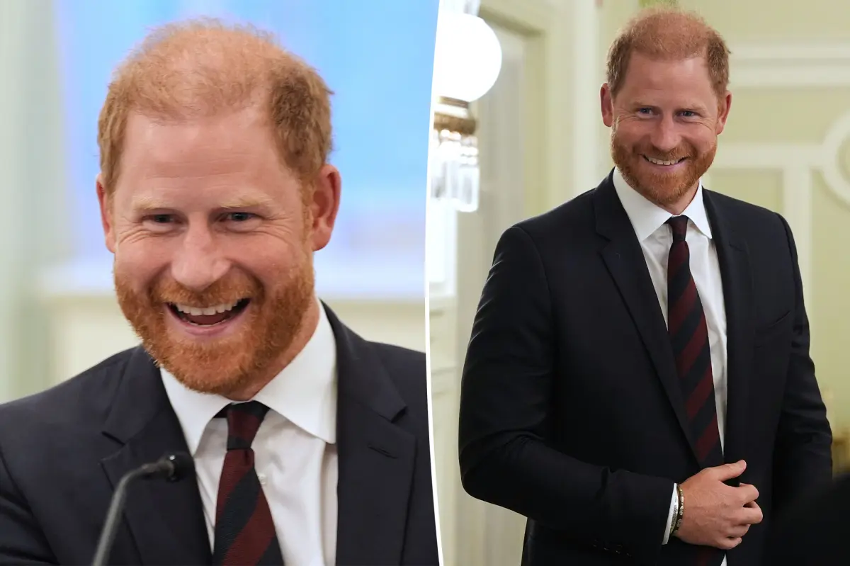 Prince Harry is all smiles as he breaks cover on same day he announces UK return