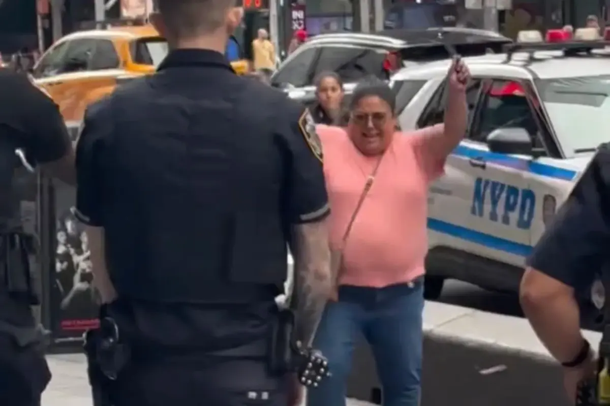 Dramatic video shows knife-wielding woman who stabbed two charge at NYC cops after making chilling threat