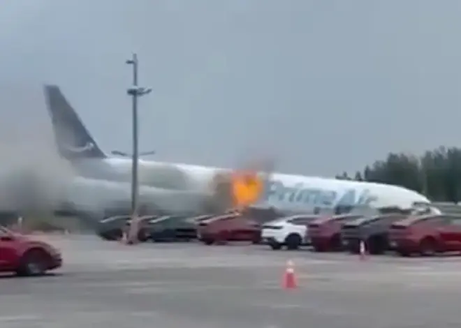 Flames shoot from Amazon cargo plane in dramatic video — as witnesses feared an explosion
