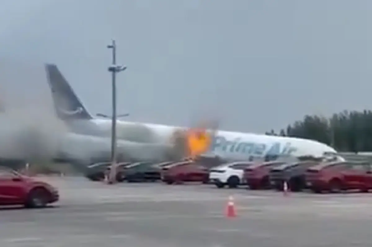 Flames shoot from Amazon cargo plane in dramatic video — as witnesses feared an explosion