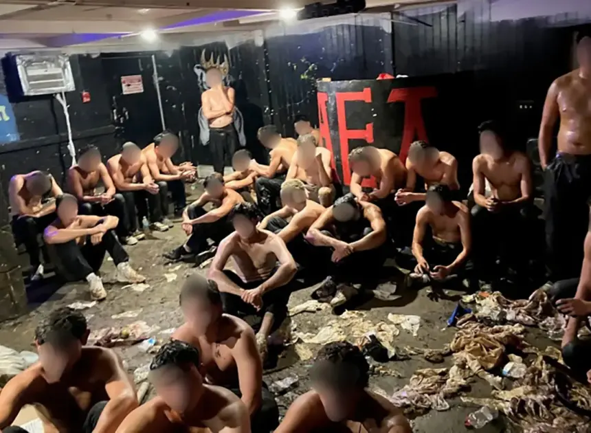 Frat leaders arrested after cops found dozens of nearly-naked teens in dingy basement in suspected hazing incident
