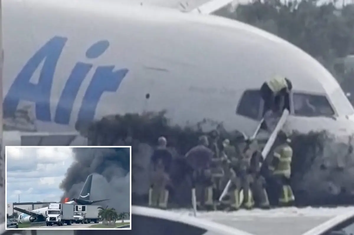 Miami firefighters seen climbing into Amazon cargo jet after shouting on dispatch ‘The plane is on fire’