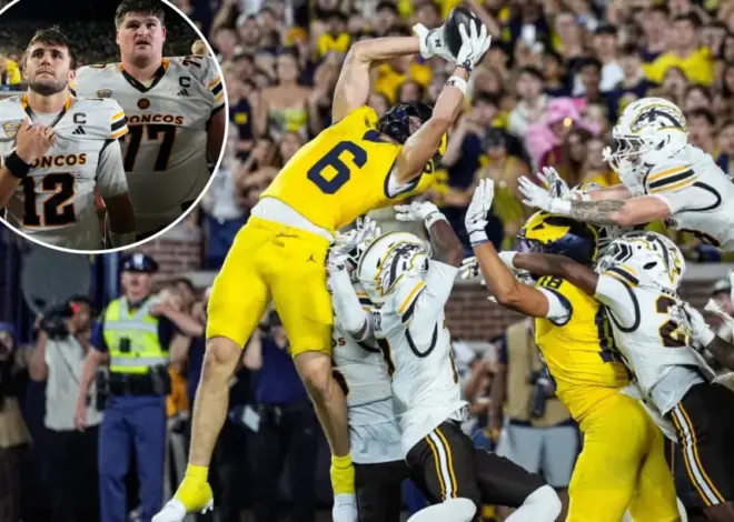 Michigan wins on second Hail Mary pass in controversial ending to avoid brutal upset