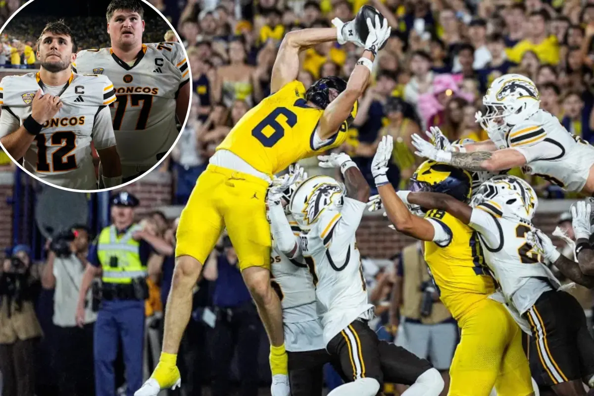 Michigan wins on second Hail Mary pass in controversial ending to avoid brutal upset